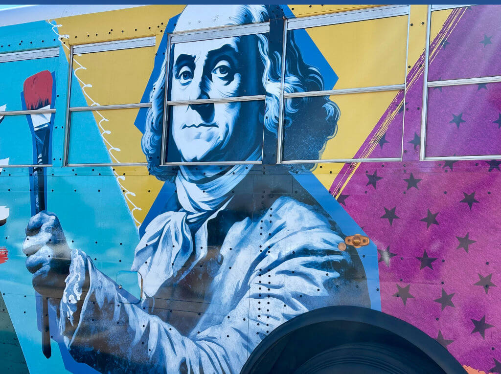 detail graphic of benjamin franklin on united we pledge liberty bus