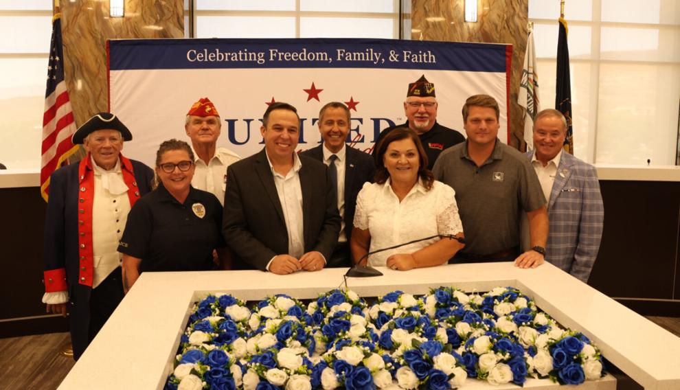 uwp_constitution_reading Washington county commissioners, united we pledge and others in front of united we pledge sign during constitution read
